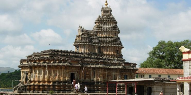 A large temple with a tower in front, part of Sringeri's cultural and spiritual heritage in Karnataka, known for its serene ambiance.