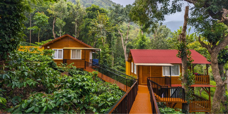 A charming cottage atop a hill, nestled in a lush forest, offering a serene retreat near Shivgiri Temple.