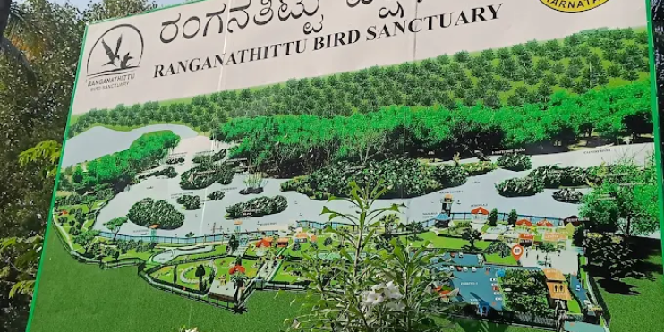 Signboard in Ranganathittu Bird Sanctuary, providing information about the park's features and visitor guidelines.